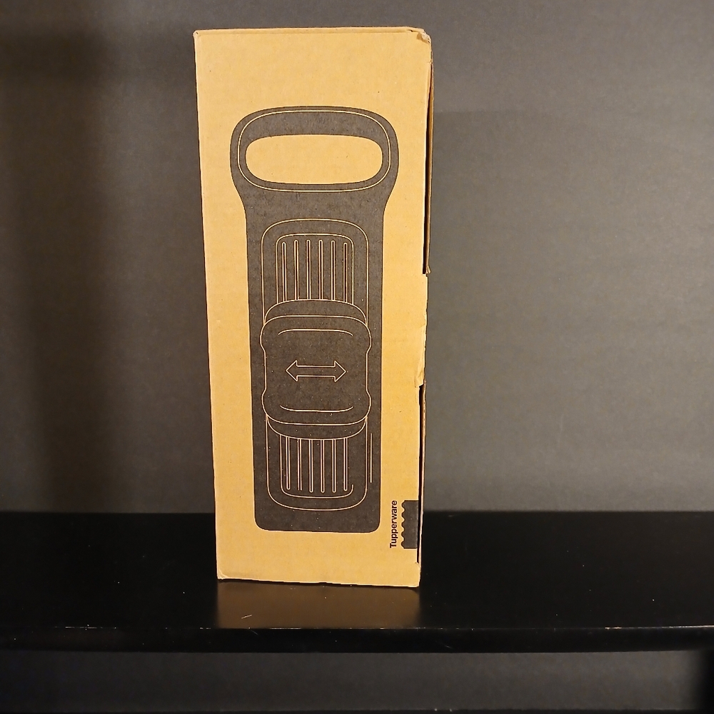 Tupperware Kitchen Utensil in Brown Packaging
